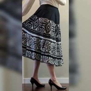 Chico's "size 1" A-line patterned beaded skirt